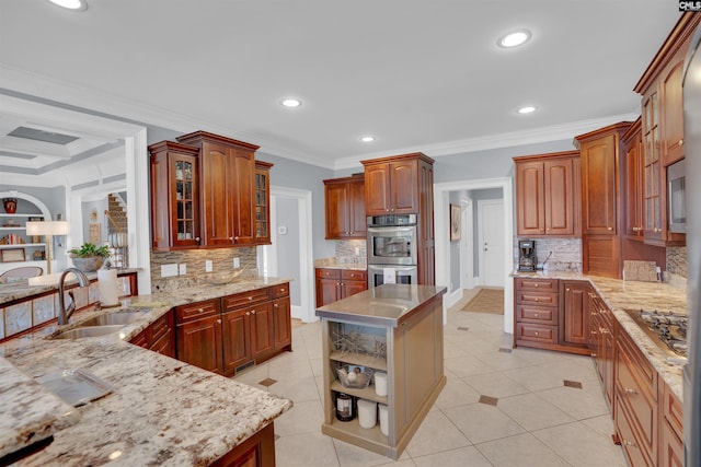 226 Forty Love Pt, Chapin, SC 29036 - kitchen featuring appliances with stainless steel finishes, glass insert cabinets, decorative backsplash, light stone countertops, and recessed lighting
