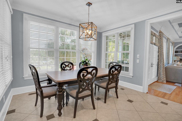 226 Forty Love Pt, Chapin, SC 29036 - dining area with plenty of natural light, ornamental molding, a chandelier, and light tile patterned floors