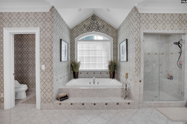 226 Forty Love Pt, Chapin, SC 29036 - bathroom featuring tile patterned floors, a bath, a stall shower, and lofted ceiling