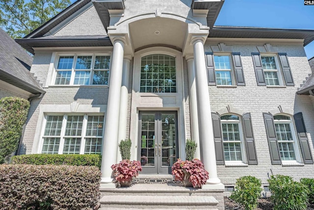 226 Forty Love Pt, Chapin, SC 29036 - view of exterior entry featuring french doors and brick siding