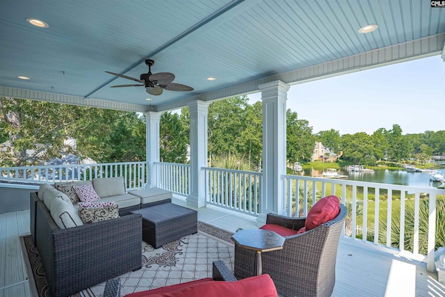 226 Forty Love Pt, Chapin, SC 29036 - wooden deck with a water view, ceiling fan, and an outdoor living space