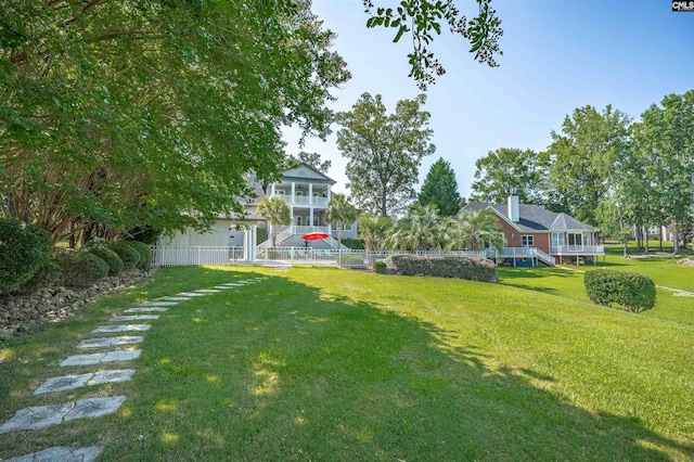 226 Forty Love Pt, Chapin, SC 29036 - view of green lawn featuring stairway, a balcony, and a porch