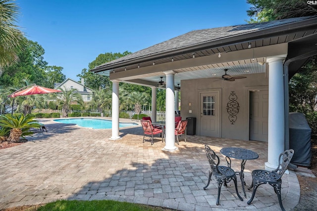 226 Forty Love Pt, Chapin, SC 29036 - view of patio / terrace with ceiling fan, an outdoor pool, and outdoor dining area