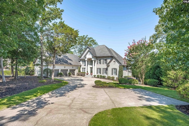 226 Forty Love Pt, Chapin, SC 29036 - view of front of property with concrete driveway, a garage, and a front yard