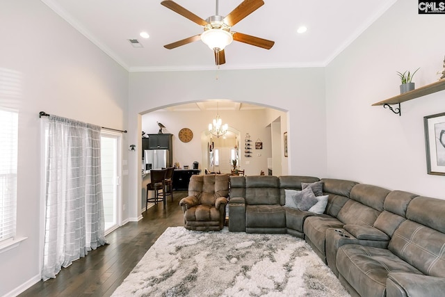 122 Azur Ave, Chapin, SC 29036 - living room featuring arched walkways, a ceiling fan, dark wood-style floors, a chandelier, and crown molding