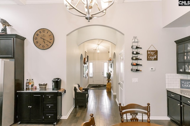 122 Azur Ave, Chapin, SC 29036 - corridor featuring arched walkways, a chandelier, and dark wood-style floors