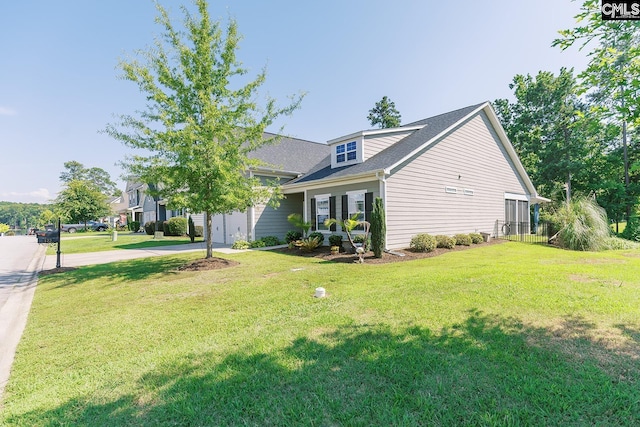 122 Azur Ave, Chapin, SC 29036 - view of front of property featuring a front yard and roof with shingles