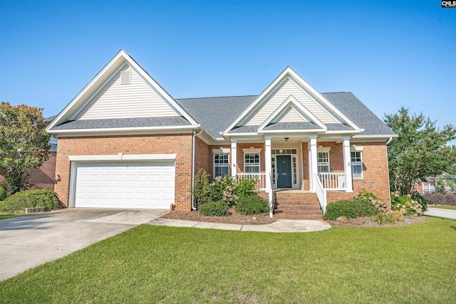 100 Ridge Top Rd, Lexington, SC 29072 - view of front of home featuring a front yard, concrete driveway, covered porch, and brick siding