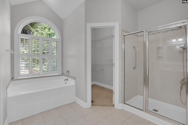 100 Ridge Top Rd, Lexington, SC 29072 - full bathroom with a stall shower, a bath, a spacious closet, tile patterned floors, and vaulted ceiling