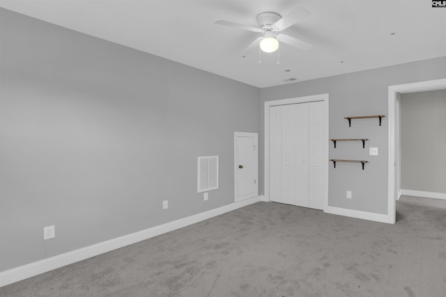 100 Ridge Top Rd, Lexington, SC 29072 - unfurnished bedroom featuring carpet flooring, a closet, and a ceiling fan