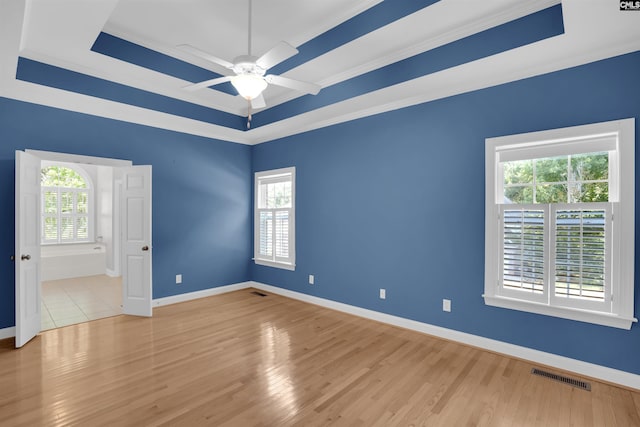 100 Ridge Top Rd, Lexington, SC 29072 - unfurnished room with a tray ceiling, ceiling fan, crown molding, and wood finished floors