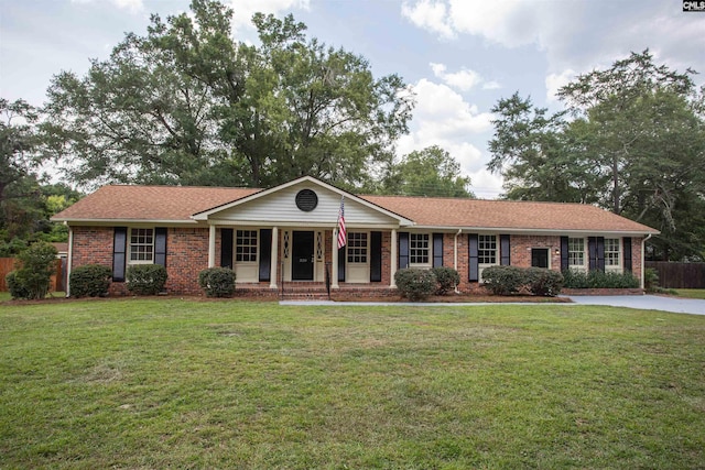 320 Perkins Ln, Camden, SC 29020 - ranch-style house with brick siding and a porch