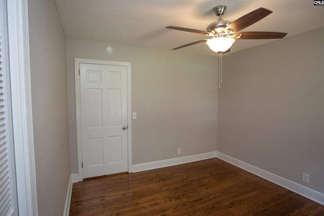 320 Perkins Ln, Camden, SC 29020 - unfurnished room with ceiling fan, dark wood-type flooring, a smoke detector, and a textured ceiling