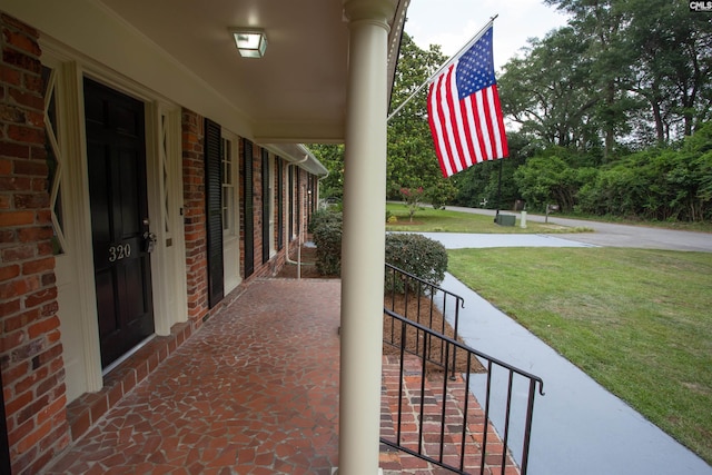 320 Perkins Ln, Camden, SC 29020 - porch featuring a lawn