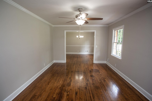 320 Perkins Ln, Camden, SC 29020 - spare room featuring a chandelier, dark wood-style floors, crown molding, and ceiling fan