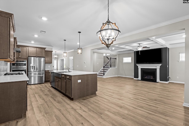 478 Harbour Pointe Dr, Columbia, SC 29229 - kitchen with appliances with stainless steel finishes, a ceiling fan, dark brown cabinetry, light countertops, and recessed lighting