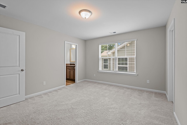 478 Harbour Pointe Dr, Columbia, SC 29229 - unfurnished bedroom featuring light carpet and connected bathroom