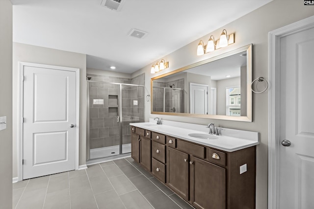 478 Harbour Pointe Dr, Columbia, SC 29229 - bathroom featuring double vanity, a shower stall, and tile patterned floors