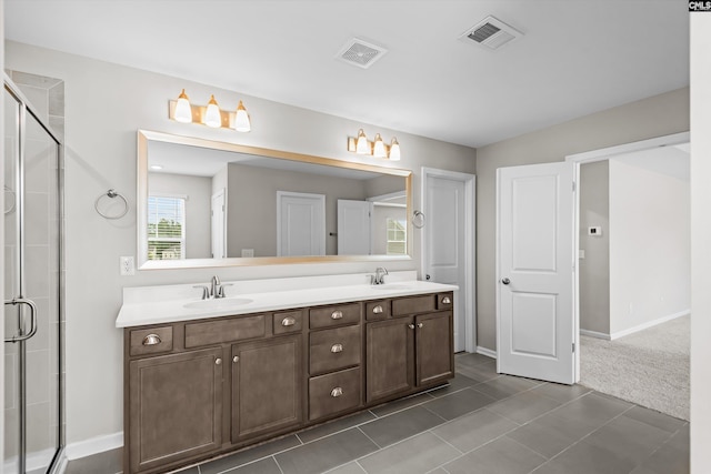 478 Harbour Pointe Dr, Columbia, SC 29229 - bathroom featuring double vanity, a shower stall, and tile patterned flooring