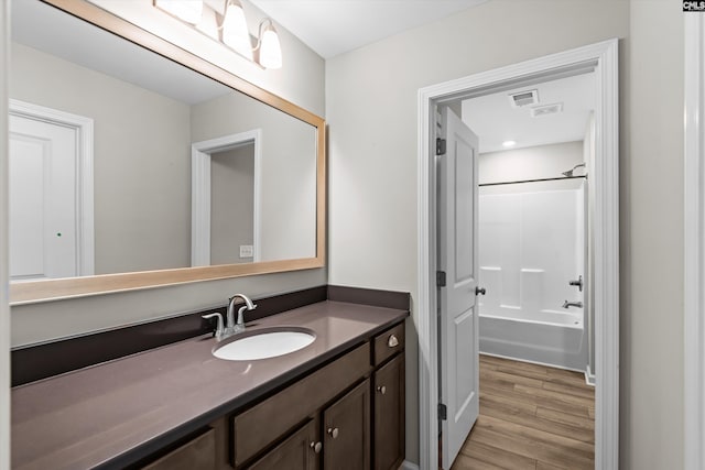 478 Harbour Pointe Dr, Columbia, SC 29229 - full bathroom featuring vanity, wood finished floors, and washtub / shower combination