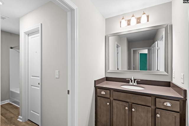 478 Harbour Pointe Dr, Columbia, SC 29229 - bathroom with vanity,  shower combination, and wood finished floors