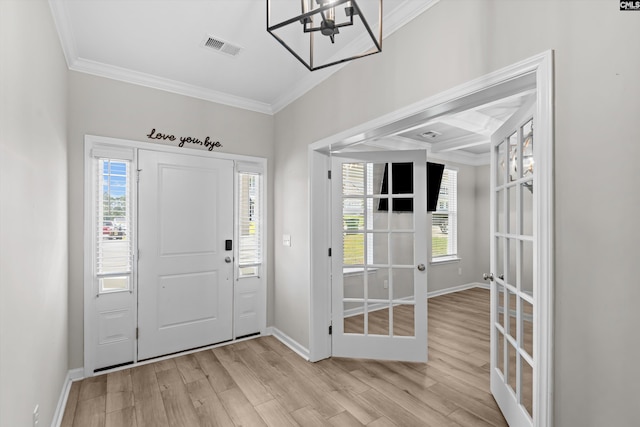 478 Harbour Pointe Dr, Columbia, SC 29229 - foyer with ornamental molding, light wood finished floors, a chandelier, and french doors