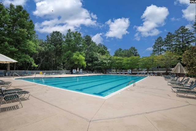 478 Harbour Pointe Dr, Columbia, SC 29229 - community pool with a patio area and view of scattered trees