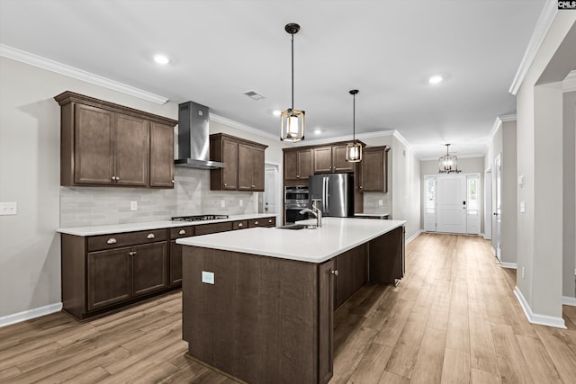478 Harbour Pointe Dr, Columbia, SC 29229 - kitchen with wall chimney exhaust hood, appliances with stainless steel finishes, dark brown cabinets, light countertops, and backsplash