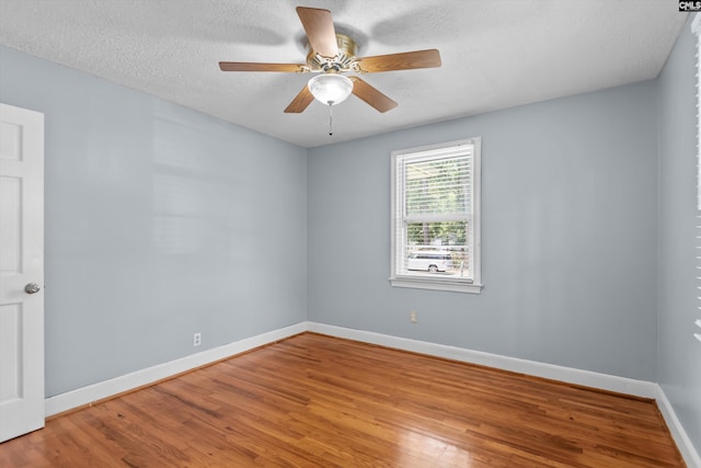 231 Horseshoe Cir, Columbia, SC 29223 - spare room featuring wood finished floors, a ceiling fan, and a textured ceiling
