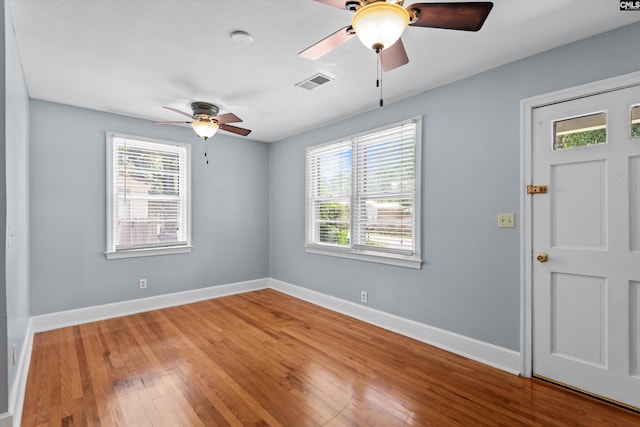 231 Horseshoe Cir, Columbia, SC 29223 - unfurnished room with ceiling fan, healthy amount of natural light, and hardwood / wood-style floors
