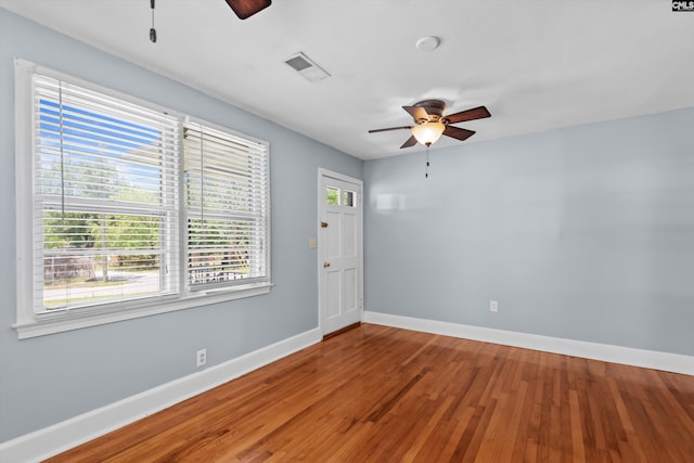 231 Horseshoe Cir, Columbia, SC 29223 - empty room featuring ceiling fan, plenty of natural light, and wood finished floors