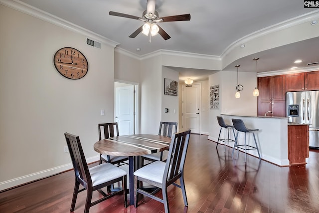 601 Main St Unit 518, Columbia, SC 29201 - dining room featuring crown molding, dark wood-style floors, and a ceiling fan