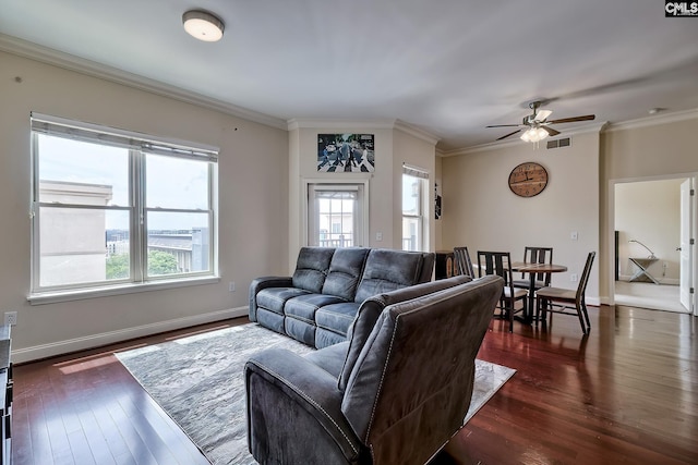 601 Main St Unit 518, Columbia, SC 29201 - living area with healthy amount of natural light, dark wood-style flooring, a ceiling fan, and ornamental molding