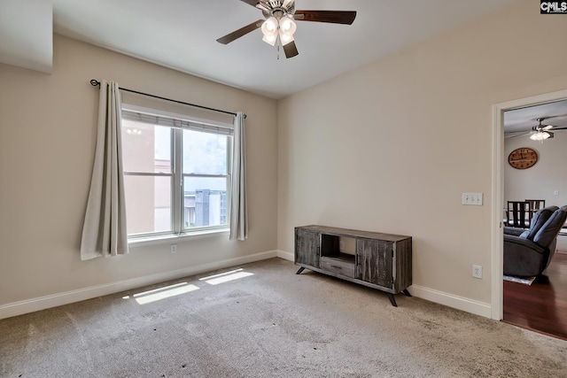 601 Main St Unit 518, Columbia, SC 29201 - carpeted empty room featuring a ceiling fan and baseboards