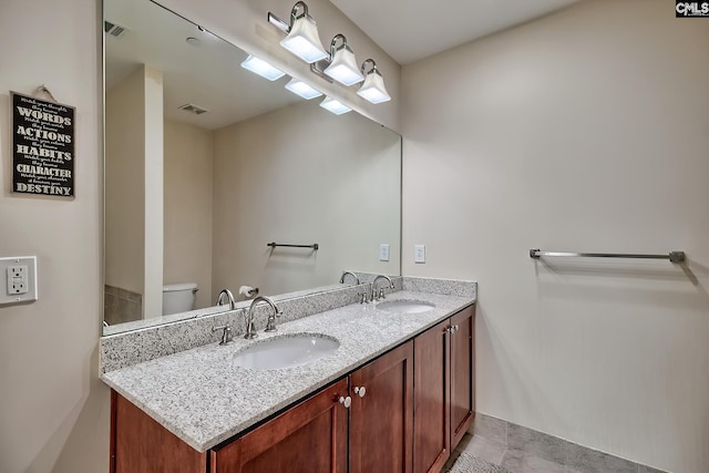 601 Main St Unit 518, Columbia, SC 29201 - bathroom with double vanity and toilet