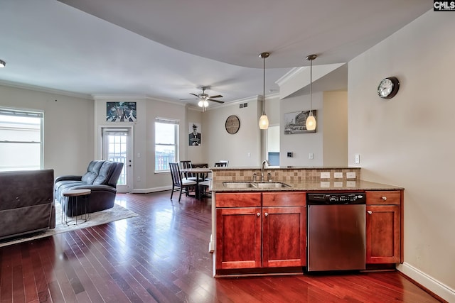 601 Main St Unit 518, Columbia, SC 29201 - kitchen with stainless steel dishwasher, open floor plan, ornamental molding, light stone countertops, and dark wood-type flooring