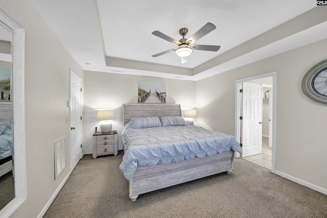 614 Beech Branch Dr, Irmo, SC 29063 - bedroom with carpet floors, a raised ceiling, and ceiling fan