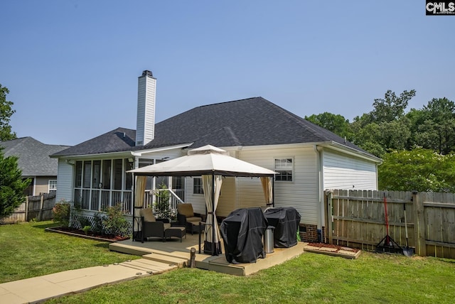614 Beech Branch Dr, Irmo, SC 29063 - rear view of property featuring a gazebo, a chimney, a sunroom, and a shingled roof