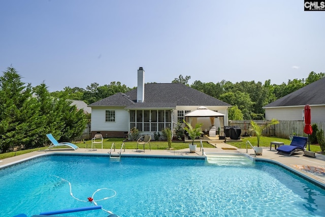614 Beech Branch Dr, Irmo, SC 29063 - view of swimming pool featuring a gazebo, a sunroom, a fenced backyard, and a patio