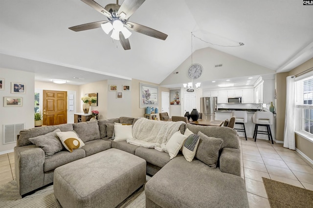 614 Beech Branch Dr, Irmo, SC 29063 - living room with light tile patterned flooring, ceiling fan, and high vaulted ceiling