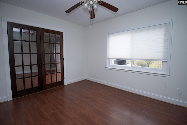 619 King St Unit 801, Columbia, SC 29205 - empty room with dark wood-style floors, french doors, and ceiling fan