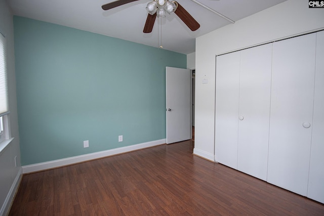 619 King St Unit 801, Columbia, SC 29205 - unfurnished bedroom featuring wood finished floors, a closet, and a ceiling fan