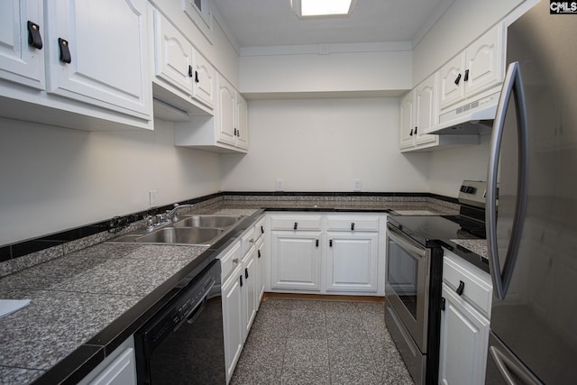 619 King St Unit 801, Columbia, SC 29205 - kitchen featuring stainless steel appliances, under cabinet range hood, white cabinetry, crown molding, and tile countertops