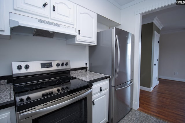619 King St Unit 801, Columbia, SC 29205 - kitchen with appliances with stainless steel finishes, crown molding, under cabinet range hood, white cabinets, and dark countertops