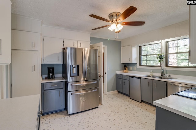 9628 Highgate Rd, Columbia, SC 29223 - kitchen featuring stainless steel refrigerator with ice dispenser, a textured ceiling, light countertops, ceiling fan, and crown molding