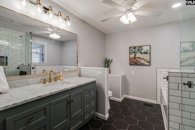 9628 Highgate Rd, Columbia, SC 29223 - full bathroom with ceiling fan, vanity, tile patterned flooring, and a shower stall