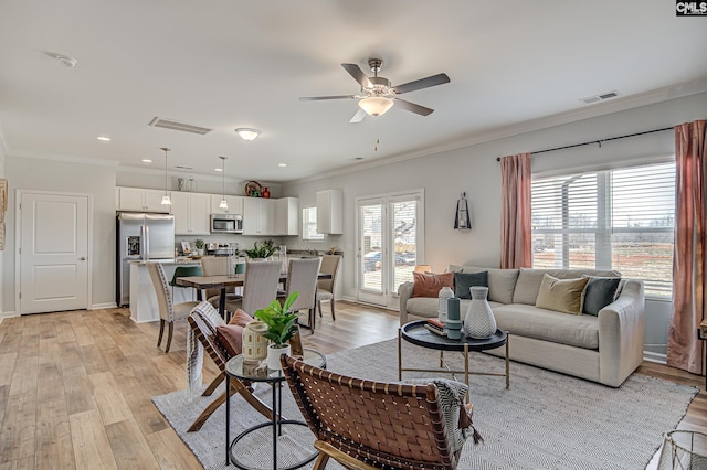 2095 County Line Trl, Elgin, SC 29045 - living area featuring crown molding, ceiling fan, light wood-style flooring, and recessed lighting