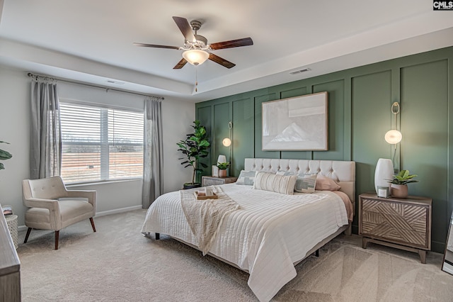 2095 County Line Trl, Elgin, SC 29045 - bedroom featuring light colored carpet, a ceiling fan, and a raised ceiling