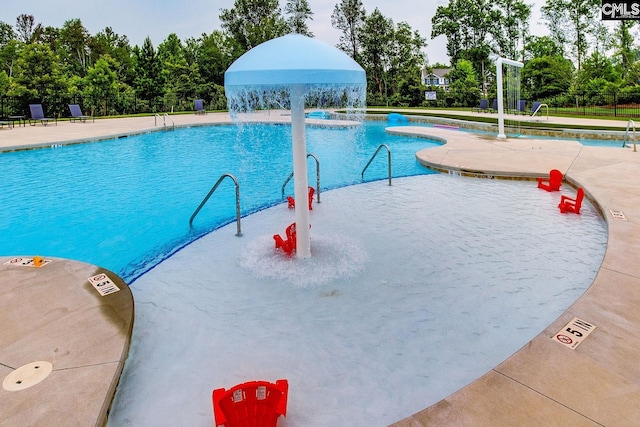 2095 County Line Trl, Elgin, SC 29045 - community pool featuring view of scattered trees and a patio area