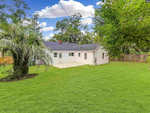 3619 Hanson Ave, Columbia, SC 29204 - rear view of property featuring a patio and a chimney